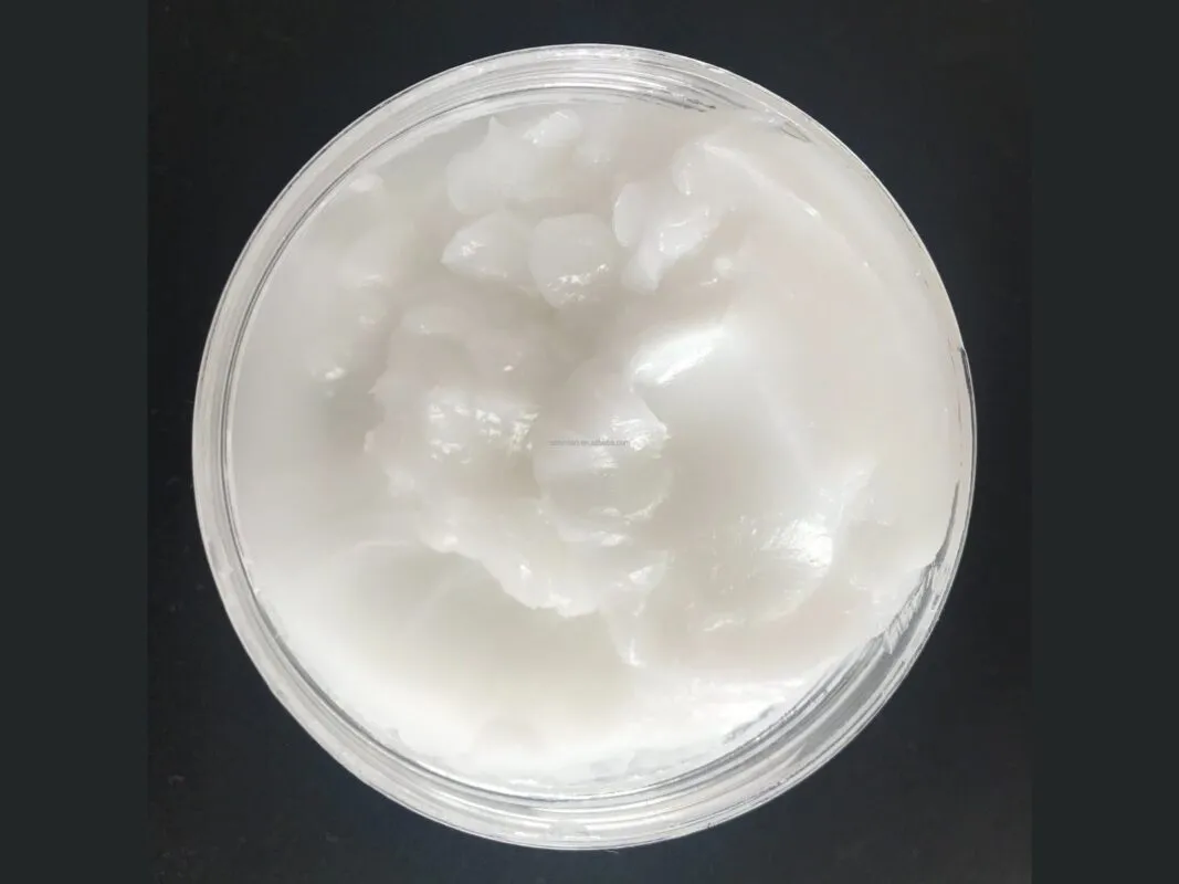 Mỡ silicon: hũ mỡ trắng nhìn từ trên xuống trên nền đen